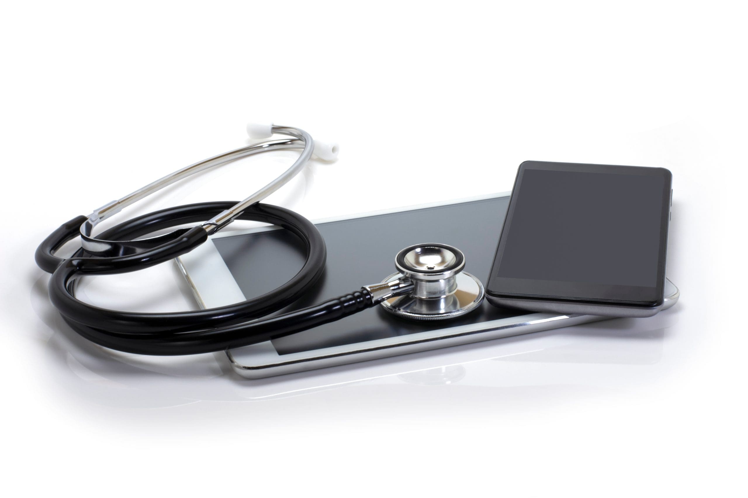 Medical stethoscope on tablet computer and smartphone