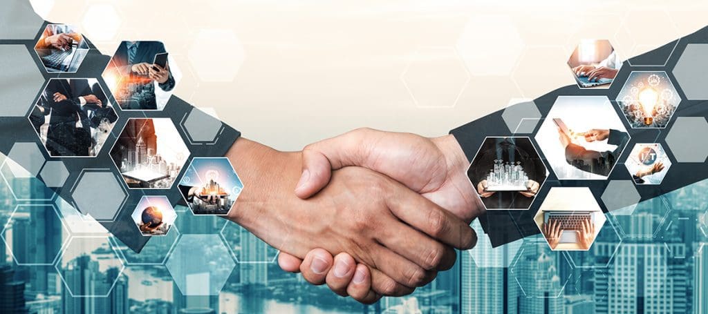 Two hands in a handshake surrounded by images of communications, computing, and the cloud.