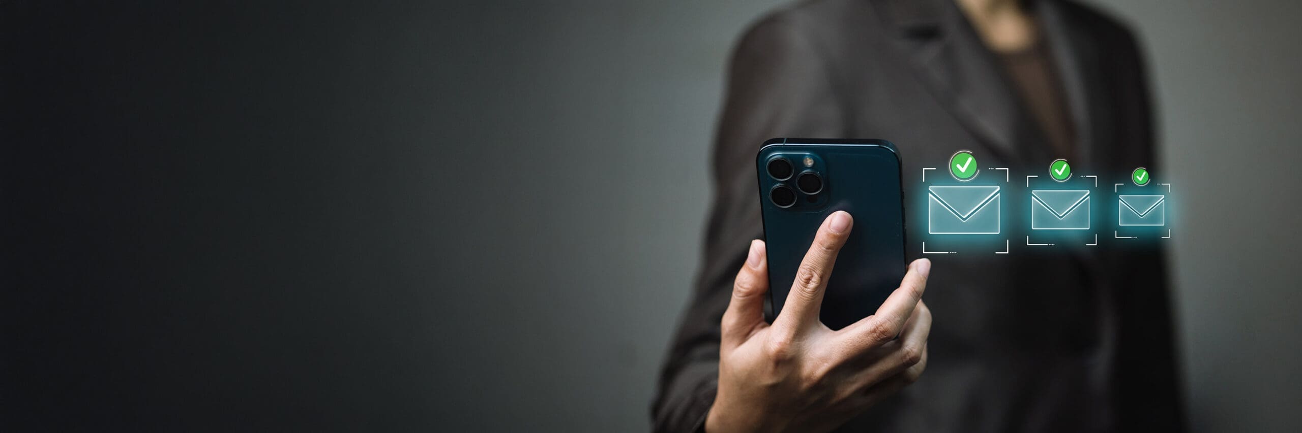 A person checking email on a phone.